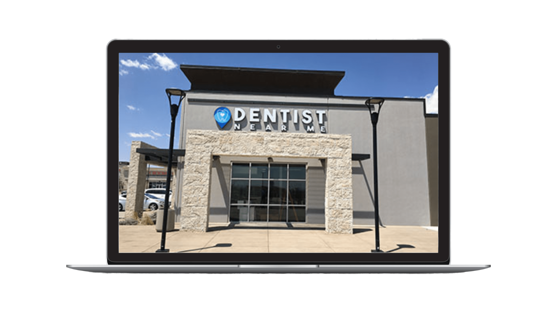 Image of Dentist Near Me in El Paso, TX in strip mall on laptop overlay