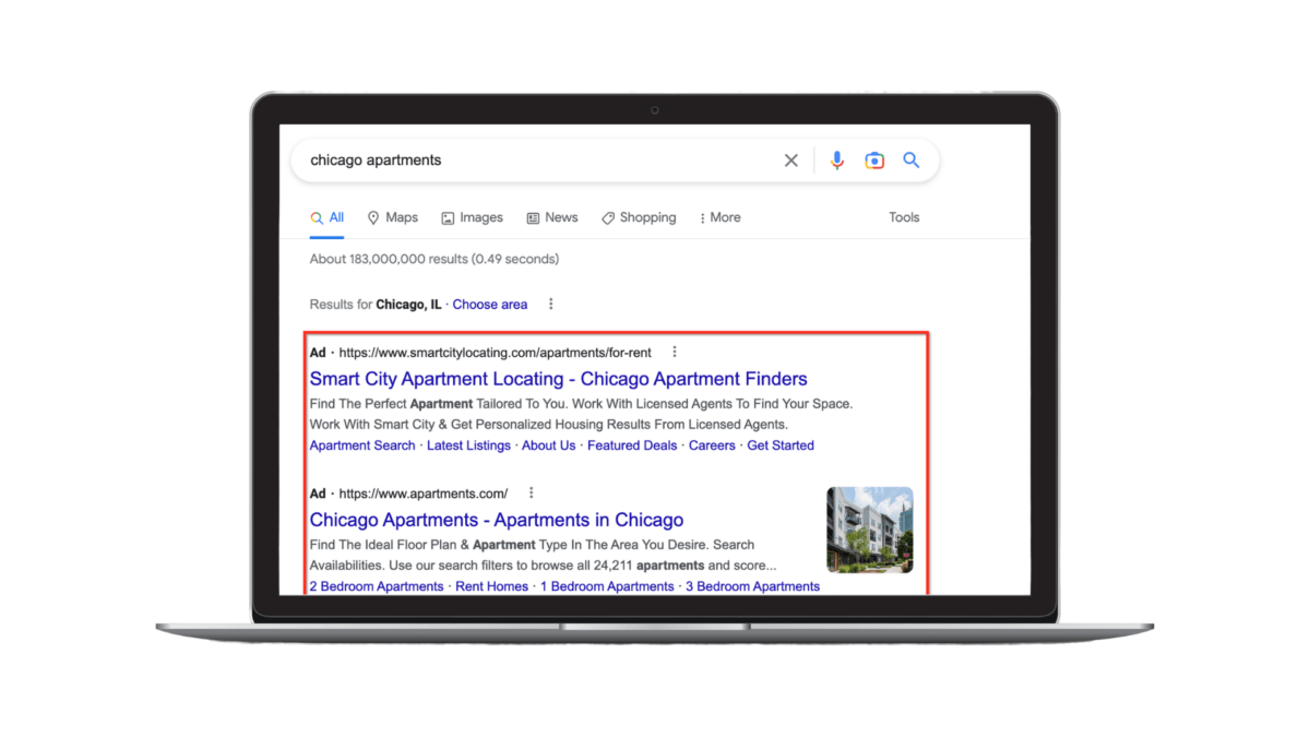 An example of a Google Ads search advertisement going after the keyword “Chicago apartments” on a laptop.